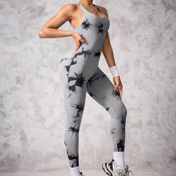 Back view of sporty woman in seamless cross-back jumpsuit using battle rope – one-piece workout wear.”